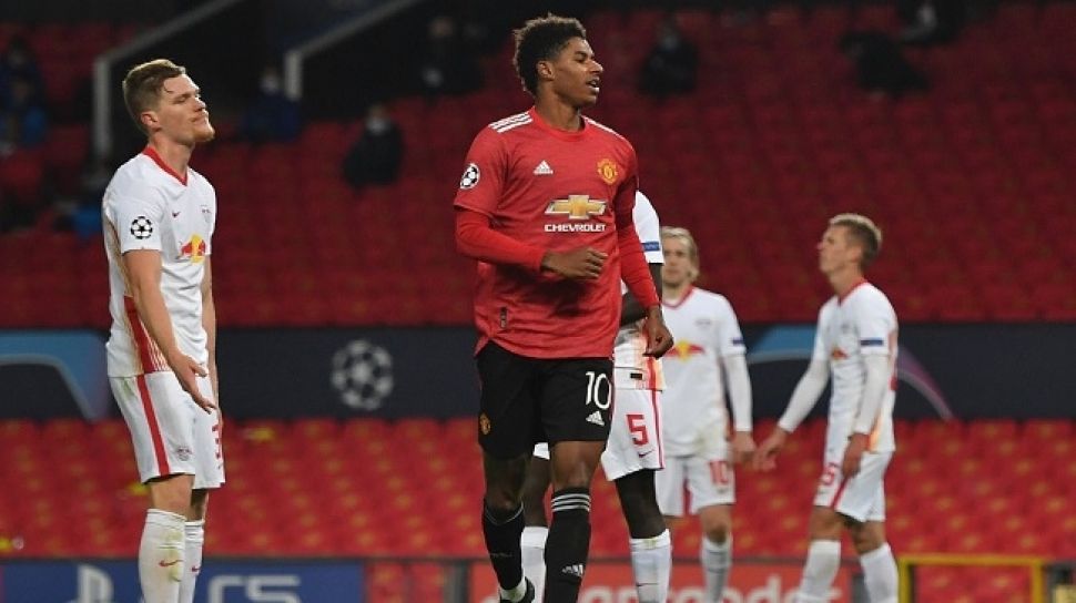Marcus Rashford mencetak hattrick saat MU menjamu RB Leipzig (Foto: AFP/Anthony Devlin)