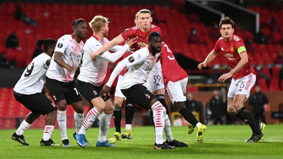 AC Milan lawan Manchester United (Foto: Laurence Griffiths/Getty Images)